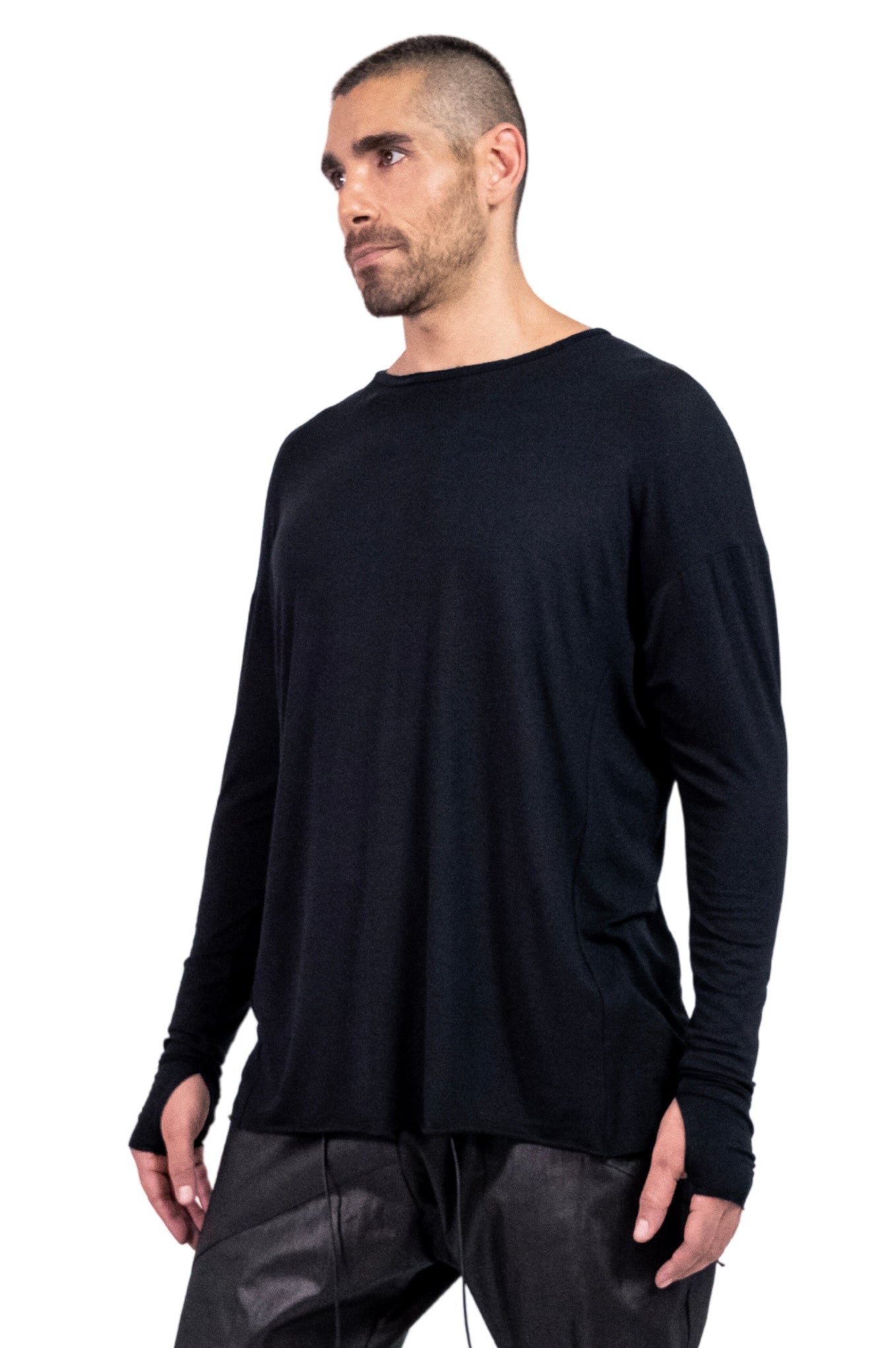 ZHANNAONA shirt long sleeve with thumb holes black assymetrical viscose knit minimalist low-key luxury Barcelona avant-garde