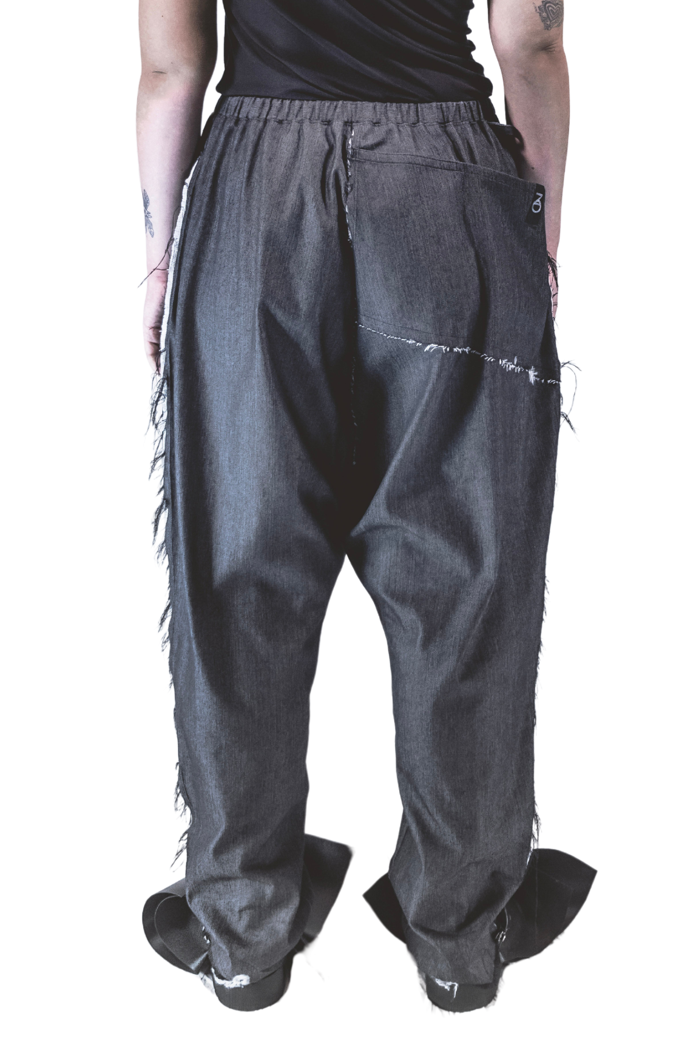 ZHANNAONA pants denim oversize cotton streetwear asymmetrical pocket with distopic details genderfluid unisex Barcelona avant-garde