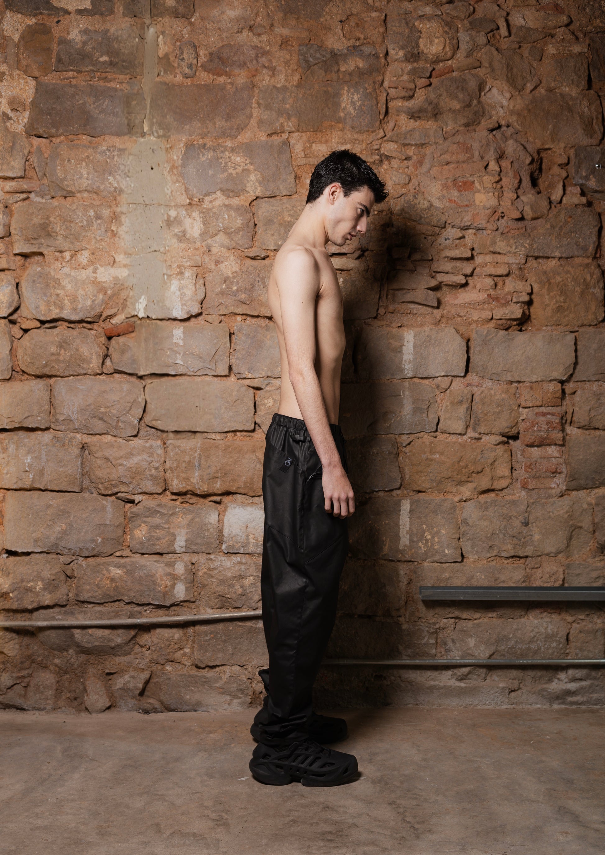 NEU Pants in Coated Denim Satin - ZHANNAONA | Pantalones - Detail View