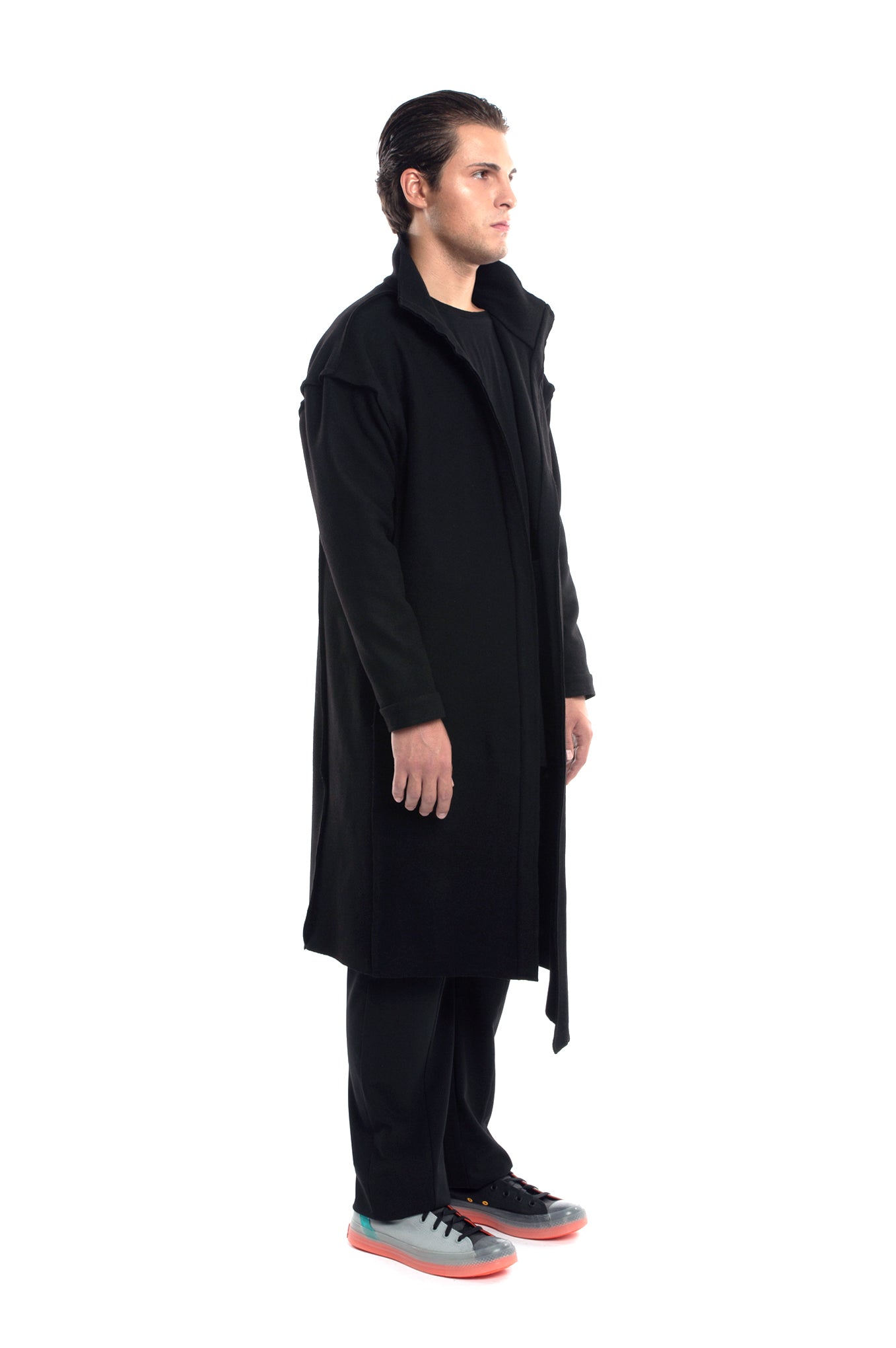 ZHANNAONA coat wool black asymmetrical high neck visible seams body diversity genderfluid oversize Barcelona avant-garde fashion