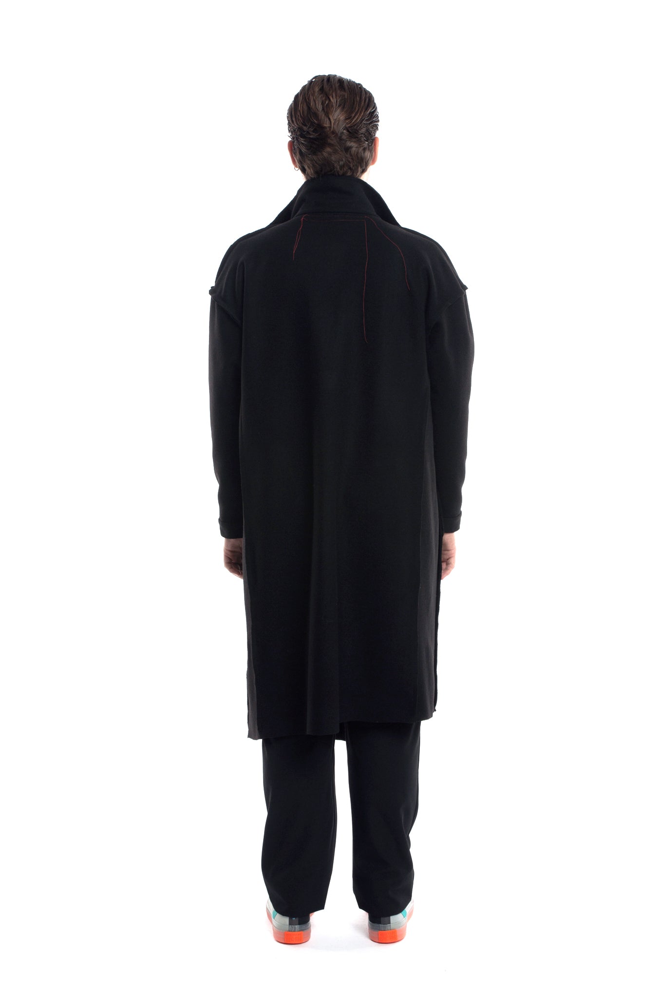 ZHANNAONA coat wool black asymmetrical high neck visible seams body diversity genderfluid oversize Barcelona avant-garde fashion